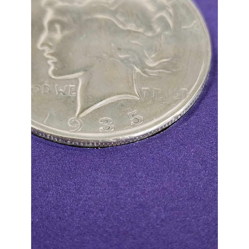 1935 Silver Peace Dollar and Stamp  o-2