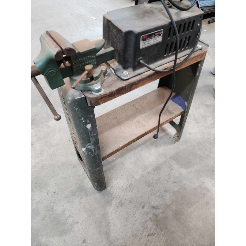 Bench vice mounted on a cart with damaged sander. A-9